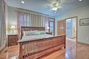 a bedroom with a bed and a ceiling fan at Lake Michigan Waterfront Home 1 Mile to Downtown! in Douglas