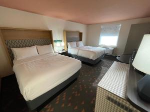 a hotel room with two beds and a window at Holiday Inn Bangor, an IHG Hotel in Bangor