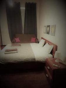 Uma cama ou camas num quarto em Alojamento Rural de Gouveia