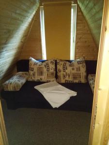 
Ein Bett oder Betten in einem Zimmer der Unterkunft Zum Eichkater
