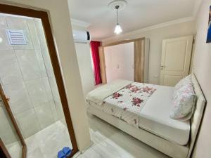 Ein Bett oder Betten in einem Zimmer der Unterkunft Trabzon Seaside