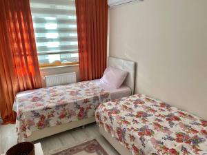Ein Bett oder Betten in einem Zimmer der Unterkunft Trabzon Seaside