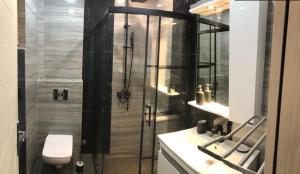 Phòng tắm tại Planinski biser Mokra Gora