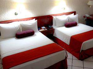 Ένα ή περισσότερα κρεβάτια σε δωμάτιο στο HOTEL BRISA Coatzacoalcos
