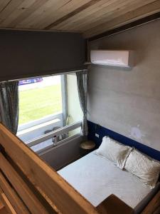 Cama o camas de una habitación en 池上5159懷舊民宿 請勿用阿勾達訂房