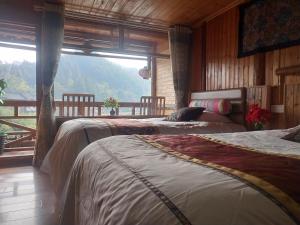 Postel nebo postele na pokoji v ubytování Bridge View Boutique Guesthouse 望桥楼精品民宿