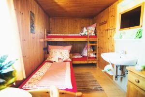 Postel nebo postele na pokoji v ubytování Krummholzhütte
