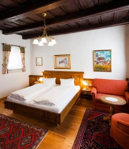 Łóżko lub łóżka w pokoju w obiekcie Hotel-Restaurant Kirchenwirt
