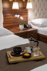 a tray of food on a table in a hotel room at Vita Suites Karaköy in Istanbul