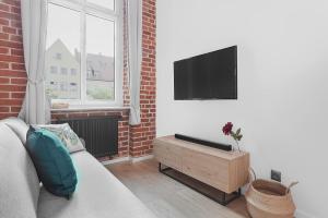 A television and/or entertainment centre at Right in the heart of Wroclaw