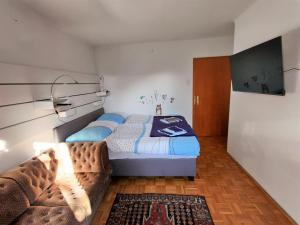 A bed or beds in a room at Ferienwohnung Werner