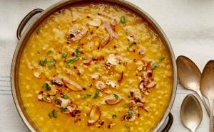 a pan filled with soup with at Shanti Jungle cottage in Mashobra +14 photos