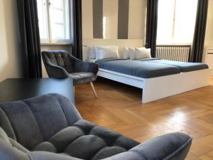 En eller flere senge i et værelse på Ela Apartments Berlin
