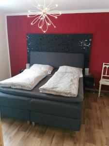 En eller flere senge i et værelse på Wohnung im Schwedenhaus
