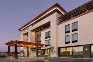 a rendering of the front of a hotel at La Quinta Inn & Suites by Wyndham Santa Rosa Sonoma in Santa Rosa