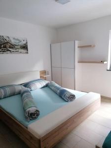 Postel nebo postele na pokoji v ubytování Appartementhaus Gleirscher