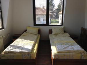 Letto o letti in una camera di Guest House Luchi