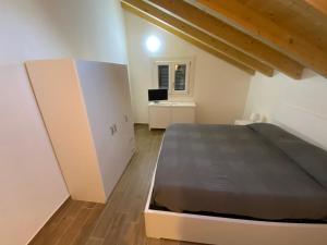 a bedroom with a large bed and a desk at Villa Canepa in Diano Marina +121 photos