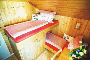Postel nebo postele na pokoji v ubytování Krummholzhütte