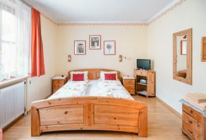 A bed or beds in a room at Prinzenhof