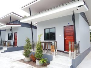 Balkón nebo terasa v ubytování เดอะเบสรีสอร์ทพัทลุง