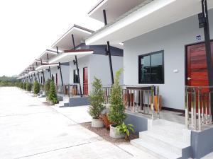 Balkón nebo terasa v ubytování เดอะเบสรีสอร์ทพัทลุง