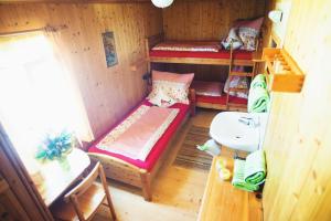Postel nebo postele na pokoji v ubytování Krummholzhütte