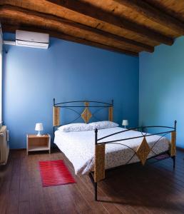 Posteľ alebo postele v izbe v ubytovaní B&B Al Vecchio Confine
