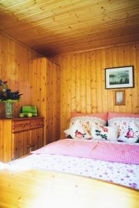 Postel nebo postele na pokoji v ubytování Krummholzhütte