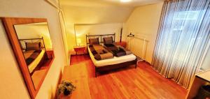 Postel nebo postele na pokoji v ubytování Sensi Living Station