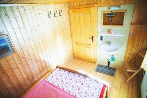 Postel nebo postele na pokoji v ubytování Krummholzhütte
