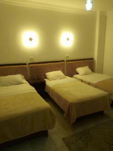 Postel nebo postele na pokoji v ubytování Arabian Nights Hostel