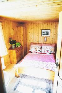 Postel nebo postele na pokoji v ubytování Krummholzhütte