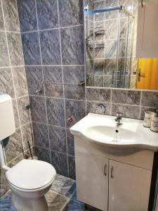 Koupelna v ubytování Apartment Stipe