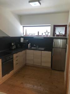 Kuchyň nebo kuchyňský kout v ubytování Horský Chalet Harrachov