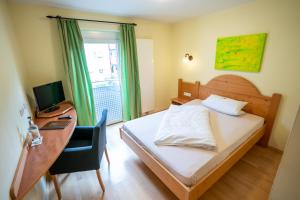 Imagen de la galería de Hotel-Gasthof zur Linde, en Langenau