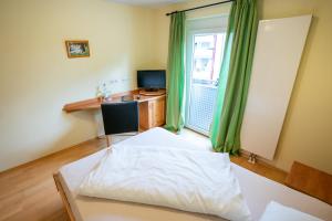 Imagen de la galería de Hotel-Gasthof zur Linde, en Langenau