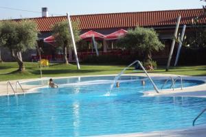 a person playing in a swimming pool at Casa da Rosa Linda in Orca