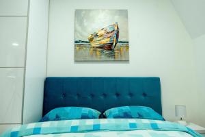 Kama o mga kama sa kuwarto sa Apartman Happy day Divčibare