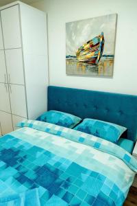 Kama o mga kama sa kuwarto sa Apartman Happy day Divčibare