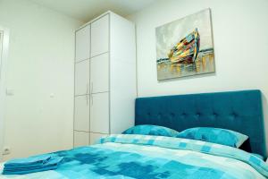Kama o mga kama sa kuwarto sa Apartman Happy day Divčibare