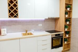 Kitchen o kitchenette sa Apartman Happy day Divčibare