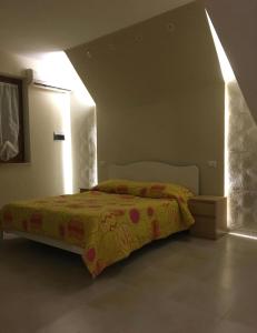 Postel nebo postele na pokoji v ubytování B&B Benevento