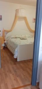 Posteľ alebo postele v izbe v ubytovaní ControVento Apartament II