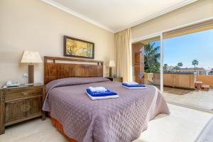Ένα ή περισσότερα κρεβάτια σε δωμάτιο στο Luxury 2BR Sea View Condo A6 by Rafleys +30 φωτογραφίες