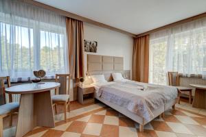 Posteľ alebo postele v izbe v ubytovaní Ambre Mare - Wypoczynek pod Palmami
