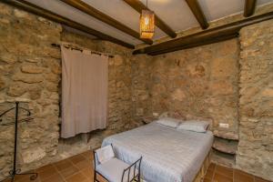 Postel nebo postele na pokoji v ubytování Casa Rural Cortijo Pesquera