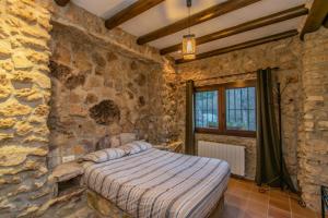 Postel nebo postele na pokoji v ubytování Casa Rural Cortijo Pesquera + 37 fotografií