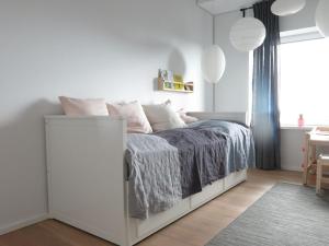 Säng eller sängar i ett rum på ApartmentInCopenhagen Apartment 1187