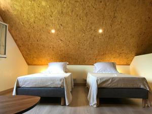 Ένα ή περισσότερα κρεβάτια σε δωμάτιο στο La Case Floria